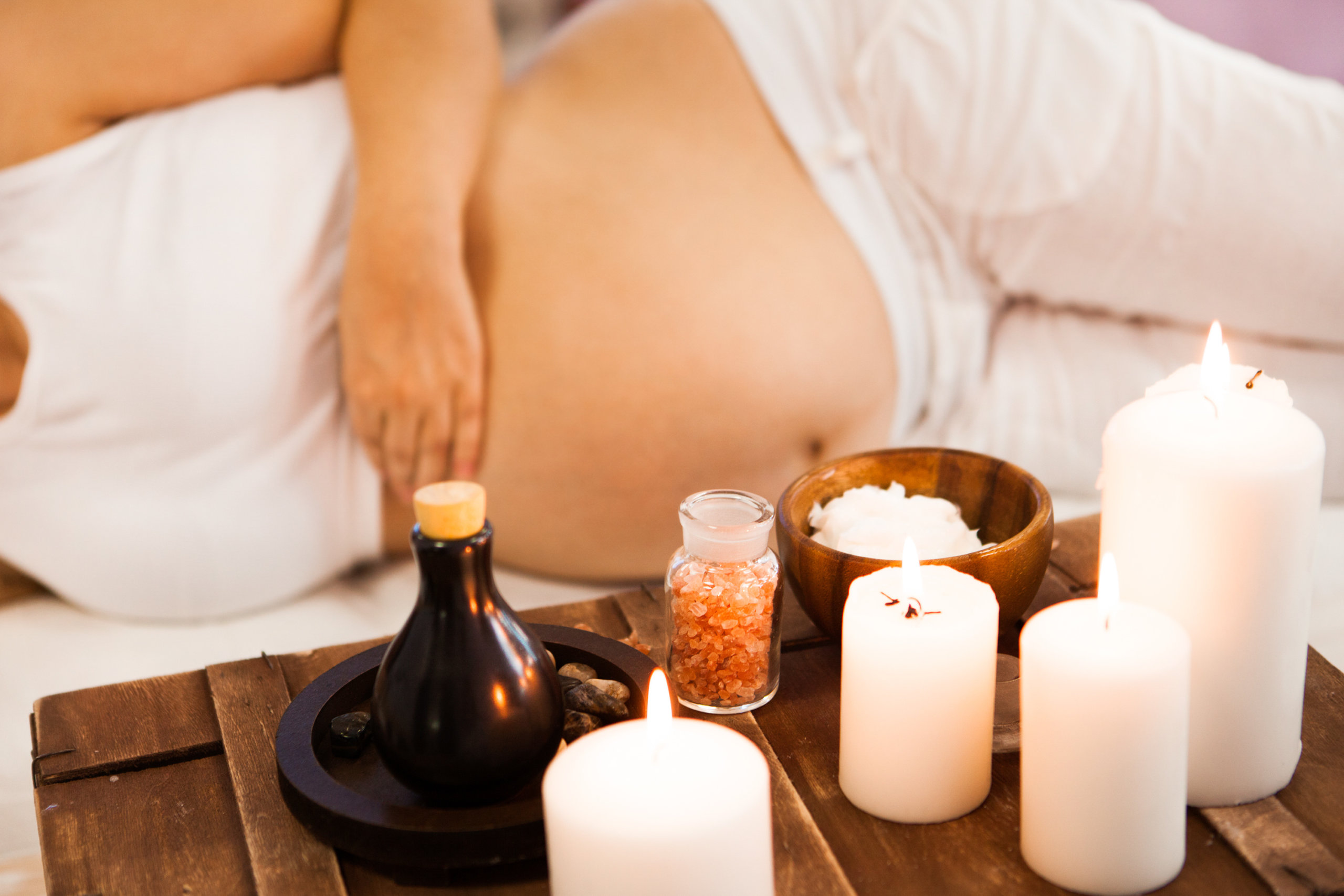 Young pregnant woman relaxing at Spa salon, Spa treatment